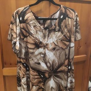 Women’s brown floral blouse.